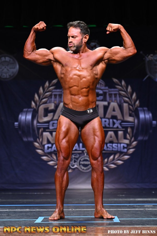 Classic Physique front double-biceps pose at the second competition