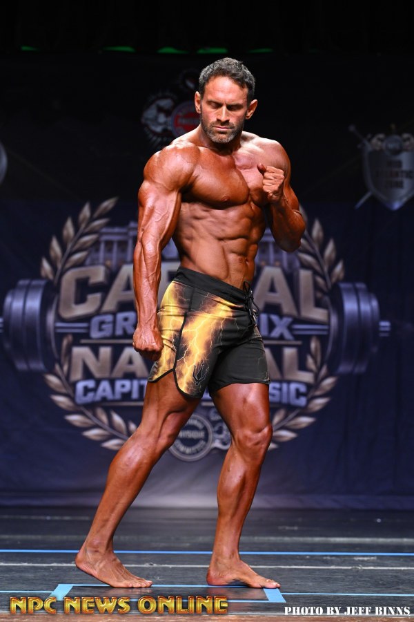 Men's Physique side pose at the second competition