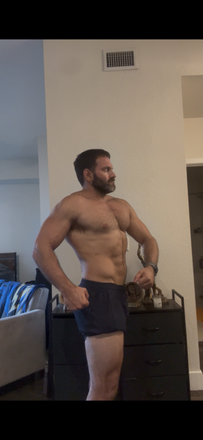 Side check-in photo at 9 weeks out